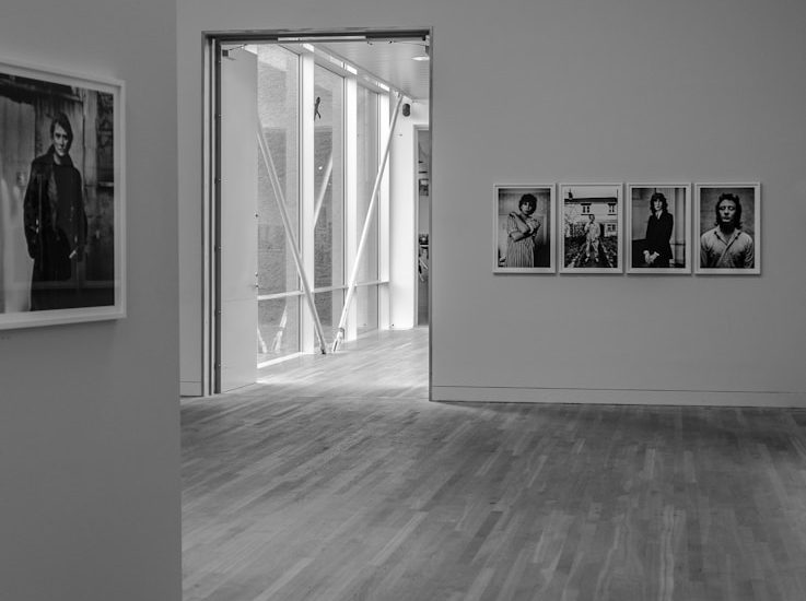 photos on wall inside building